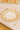 GRANDE ASSIETTE large white ceramic dinner plate with a classic round shape and elegant rim.