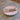 Assiette Granito Blush ceramic dinner plate with a soft blush-colored granite-inspired design.