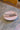Assiette Granito Blush ceramic dinner plate with a soft blush-colored granite-inspired design.