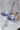 SALADIERS CONIQUES ceramic salad servers with stainless steel handles, silver finish.