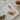 Rectangular service plate made of ceramic, white color, with a modern design.