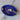Plat ovale Empreinte bleu majorelle gold, bleu majorelle ceramic plate with gold accents and embossed design.