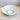 Saladier Bas Vague Mint ceramic dinner plate with a soft mint green glaze.