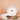 Saladier Bas ceramic salad bowl with white glaze and natural wood serving utensils.