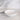 Saladier Bas ceramic salad bowl with white glaze and natural wood serving utensils.